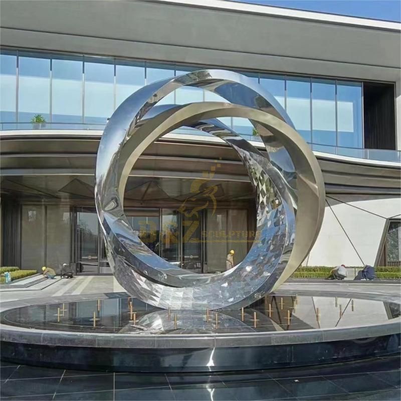 Large modern stainless steel mirror ring sculpture