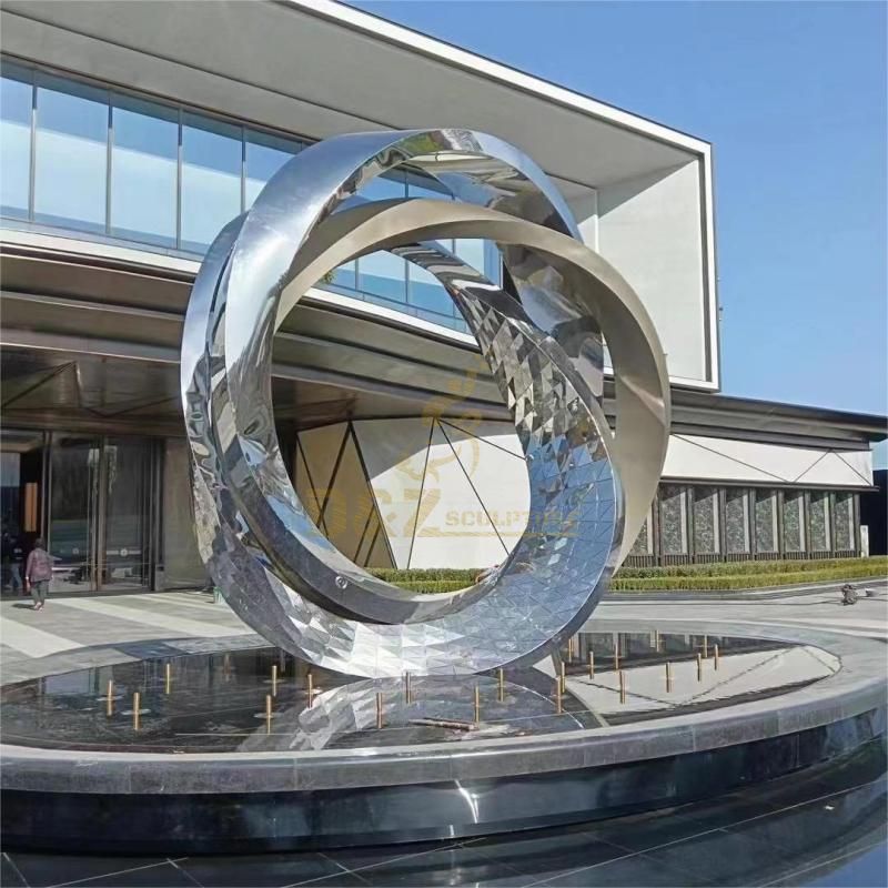 Large modern stainless steel mirror ring sculpture