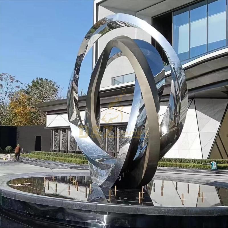 Large modern stainless steel mirror ring sculpture