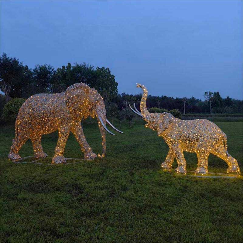 Stainless steel hollow art elephant family sculptures with lighting system, suitable for festival celebrations