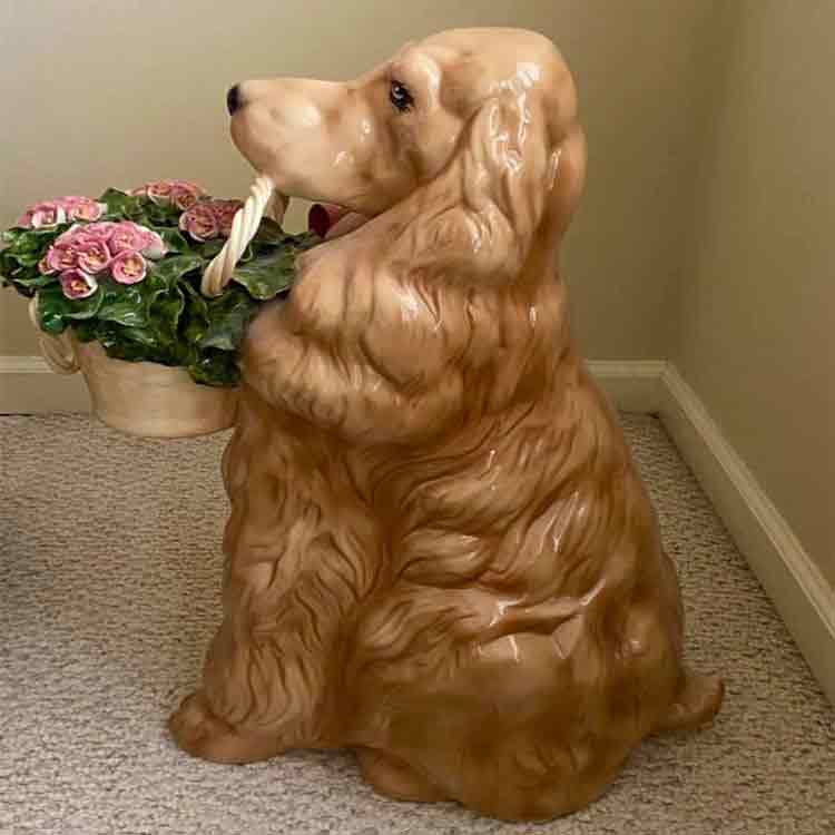 fiberglass dog statue with basket