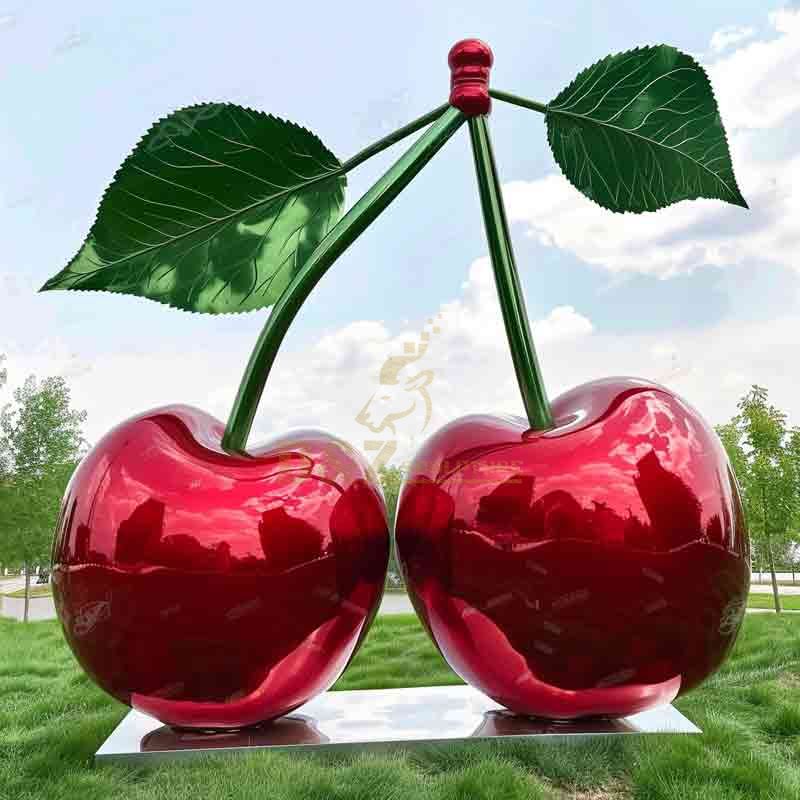 large red cherry sculpture