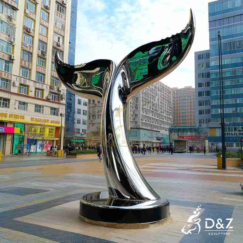 whale tail outdoor sculpture
