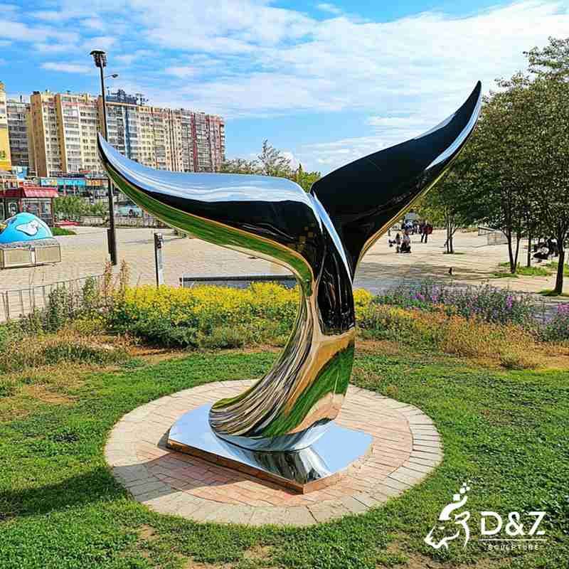 large whale tail sculpture