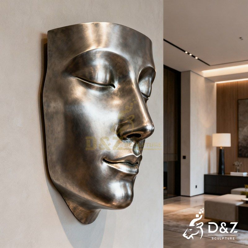 metal face sculpture