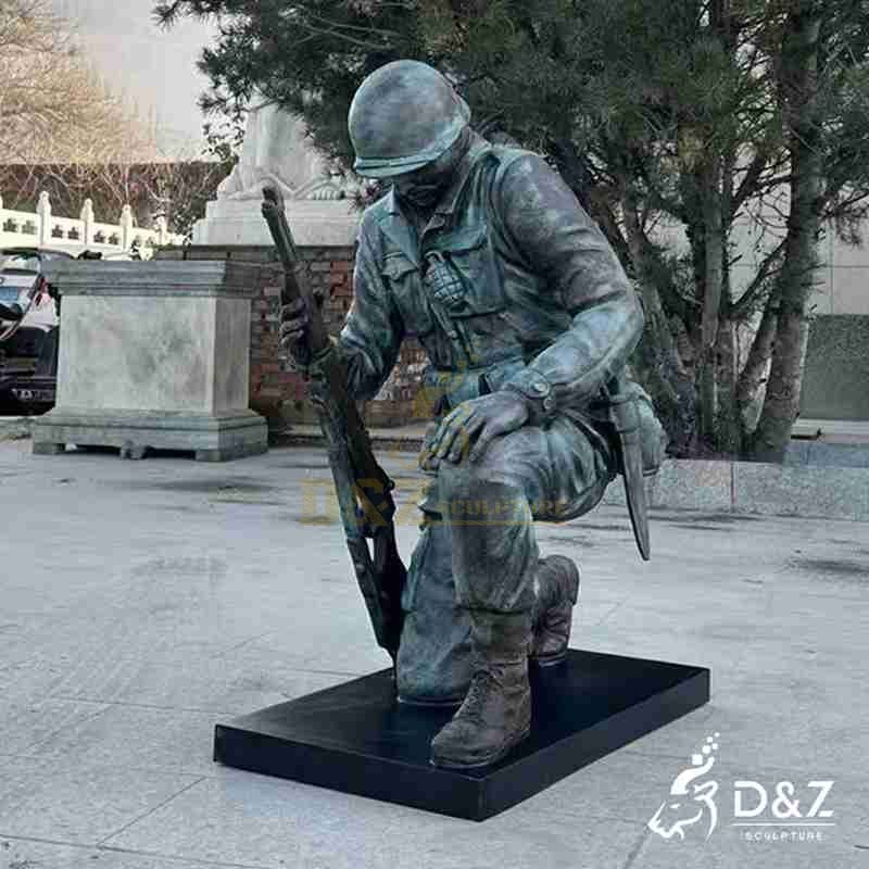 large kneeling soldier statue