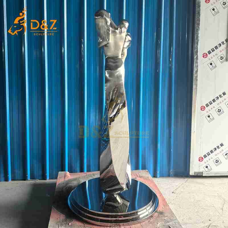 lovers embrace sculpture