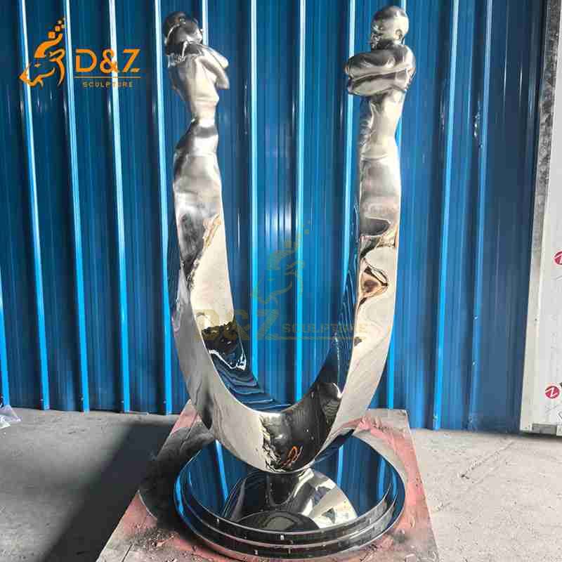 couple embrace sculpture