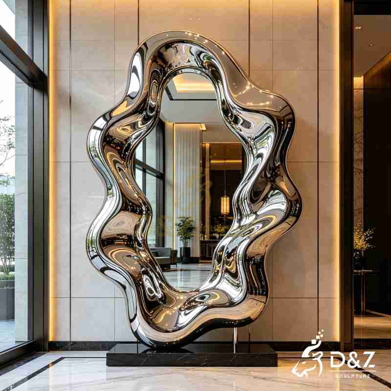 mirrored metal wall sculpture