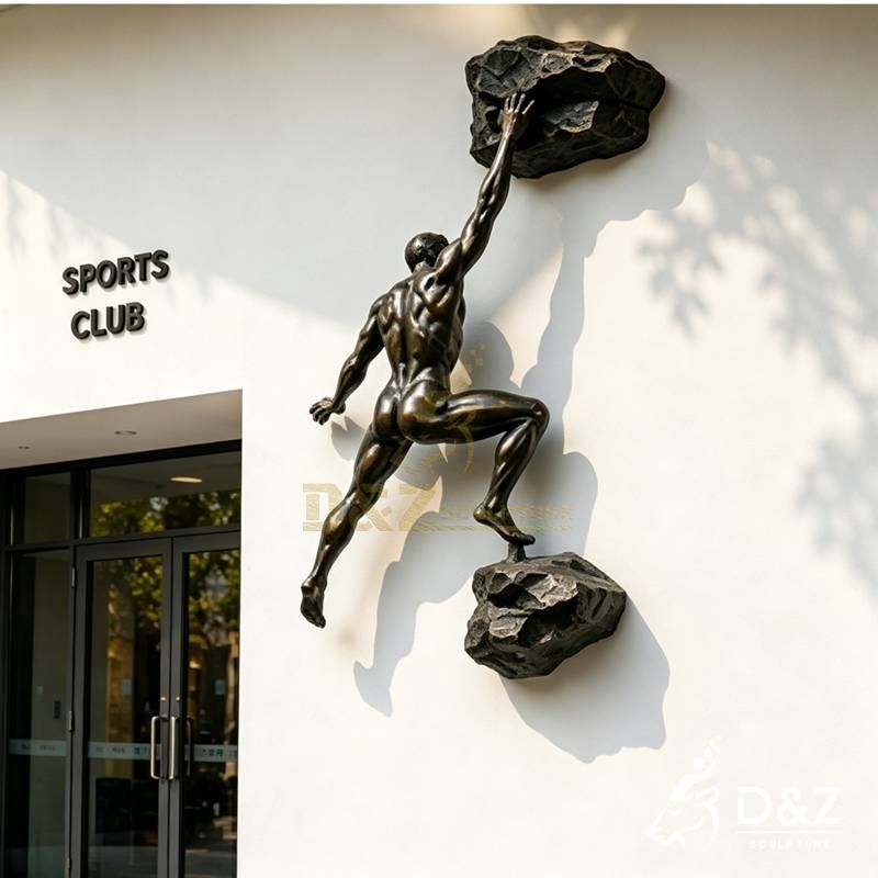 rock climbing man sculpture