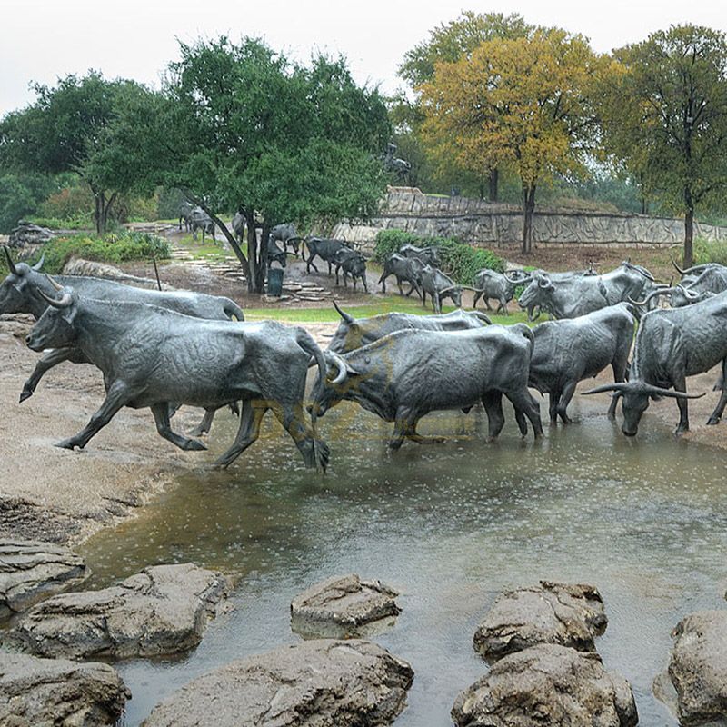 bronze cowboy sculptures with hrose