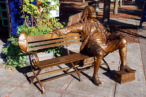 Man Sitting On Bench Bronze Sculpture