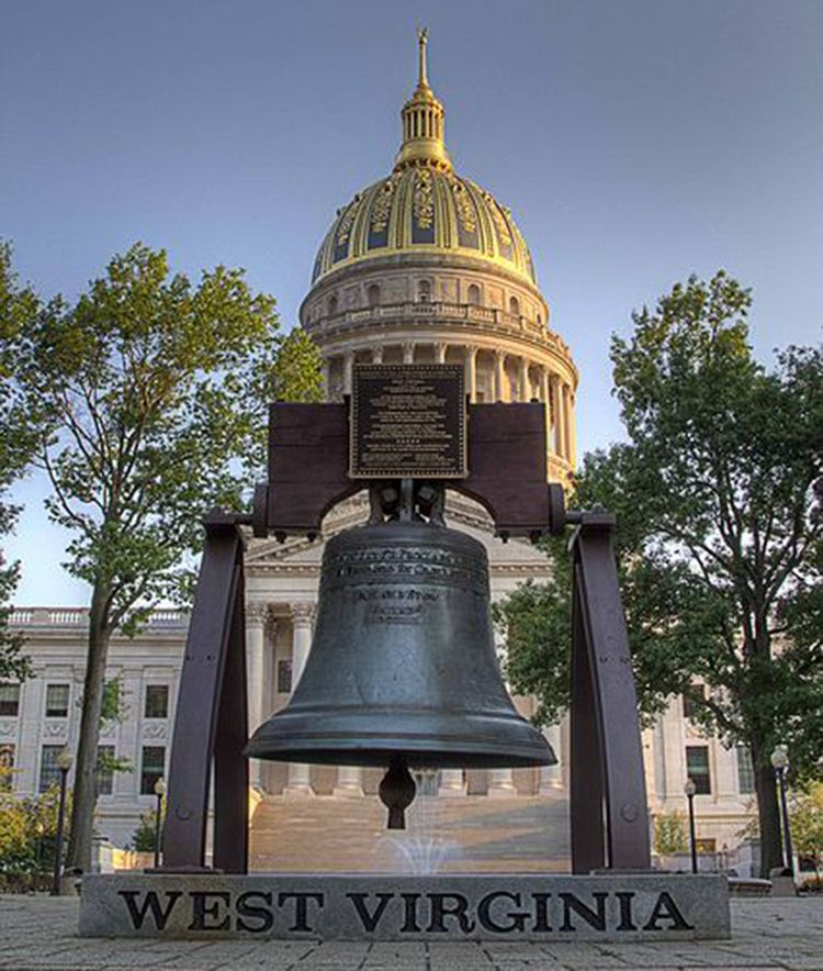 Custom made cast bronze Bell with rose