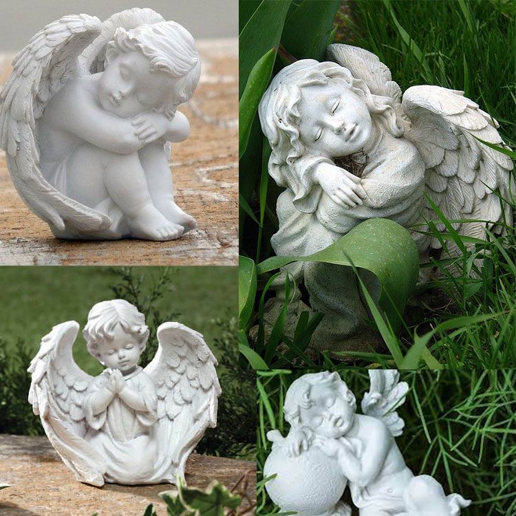 sleeping baby wrapped in angel wings statue for sale