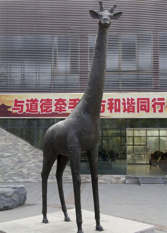 large sitting giraffe statue for garden
