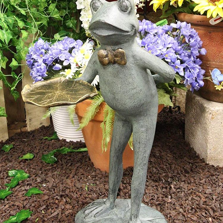 frog butler table in the garden