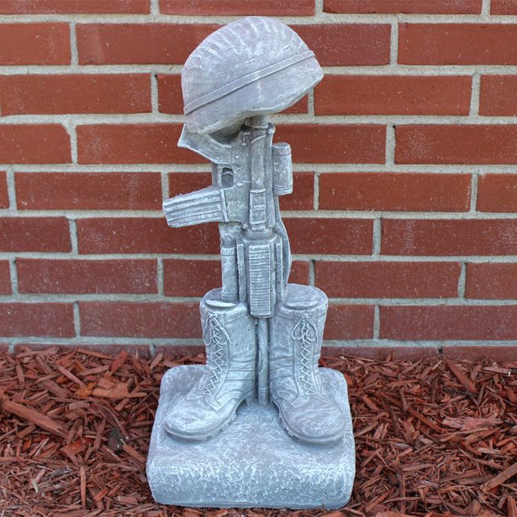 Soldier Kneeling At Cross Statue