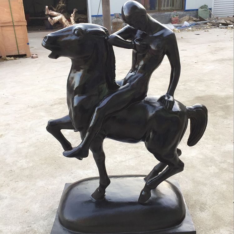 man riding horse statue.jpg