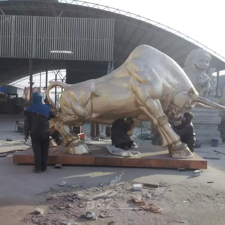 large bronze charging bull statue