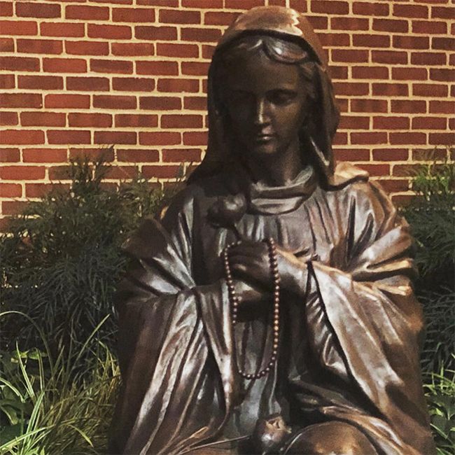 our lady of the holy rosary statue