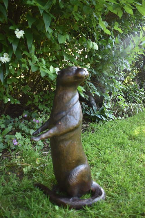 bronze otter statue