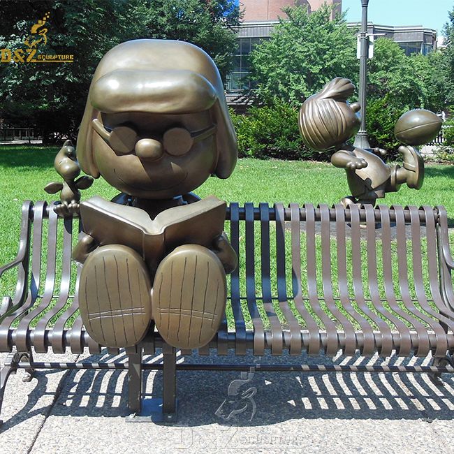 little girl on bench garden statue