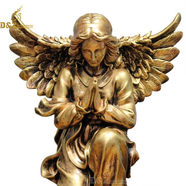 kneeling praying angel statue