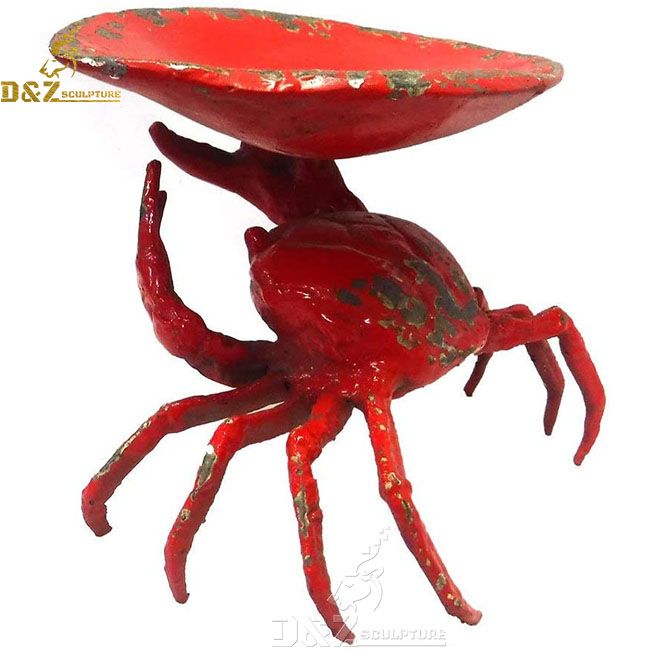 crab waiter statue