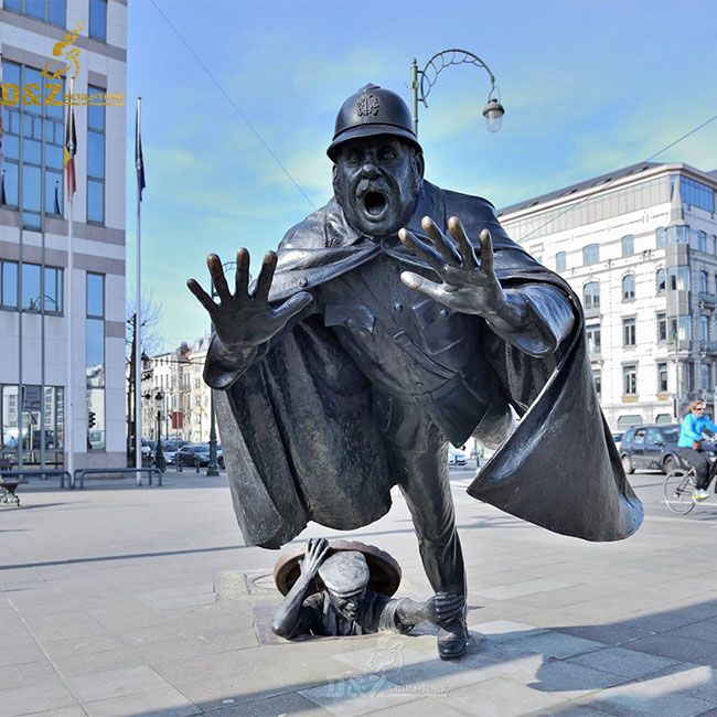 tripping policeman statue
