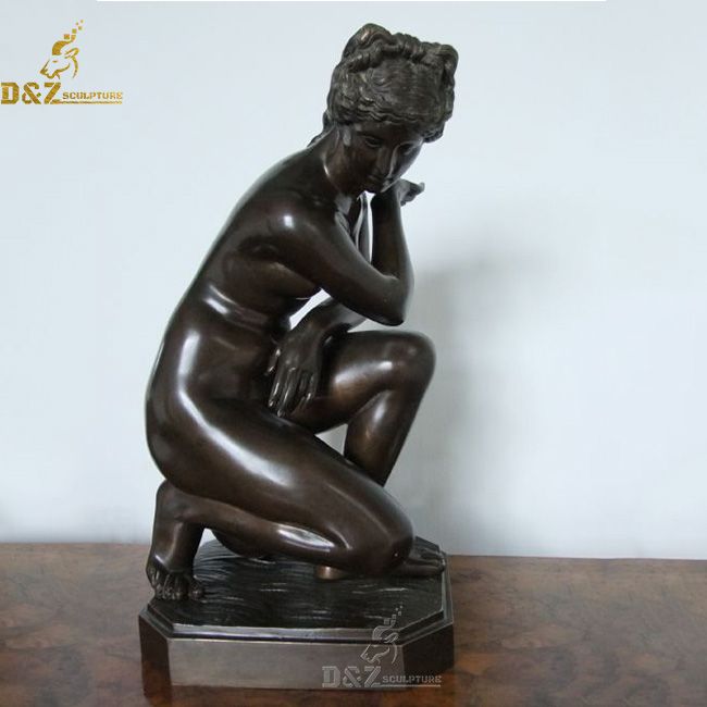 crouching aphrodite statue