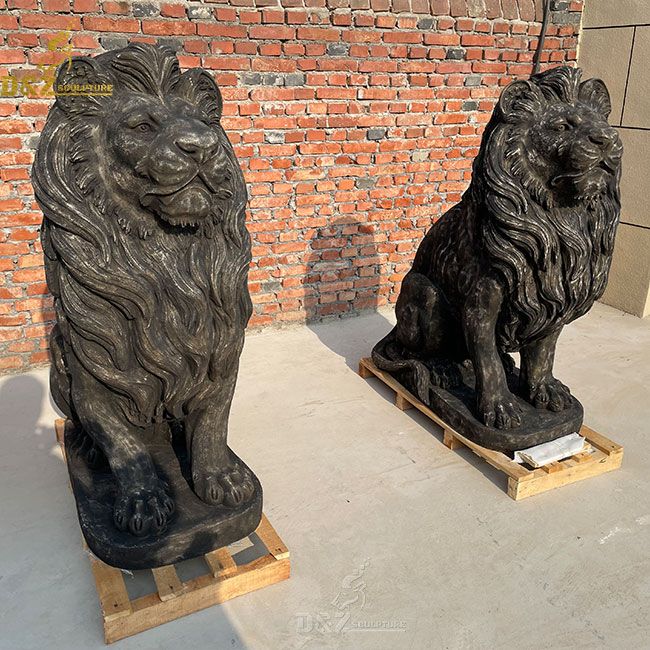 lion statues in front of house