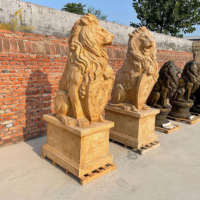 Antique sitting lion with shield marble statue