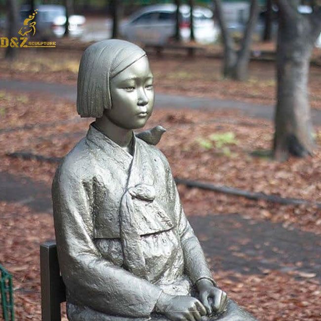 statue of a girl of peace