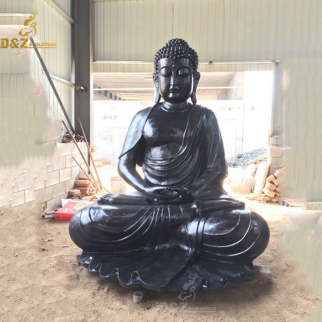 Black peaceful meditating buddha statue