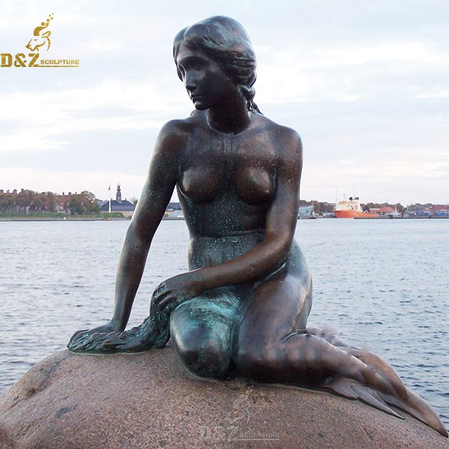 mermaid on a rock statue