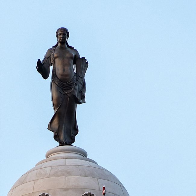 statue on top of missouri state capitol