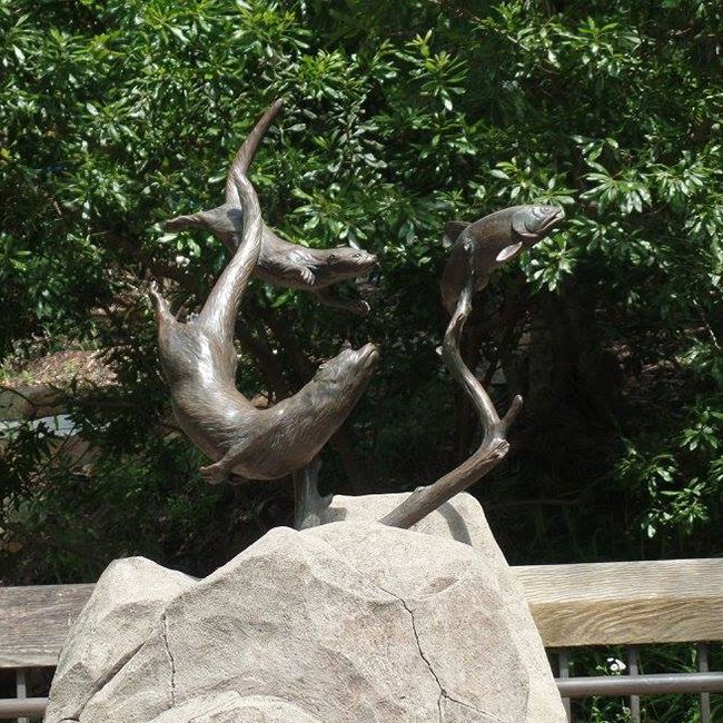 outdoor otter statue