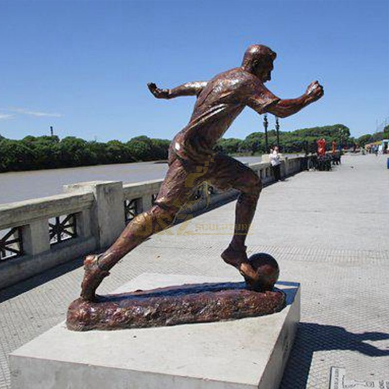 soccer player statue