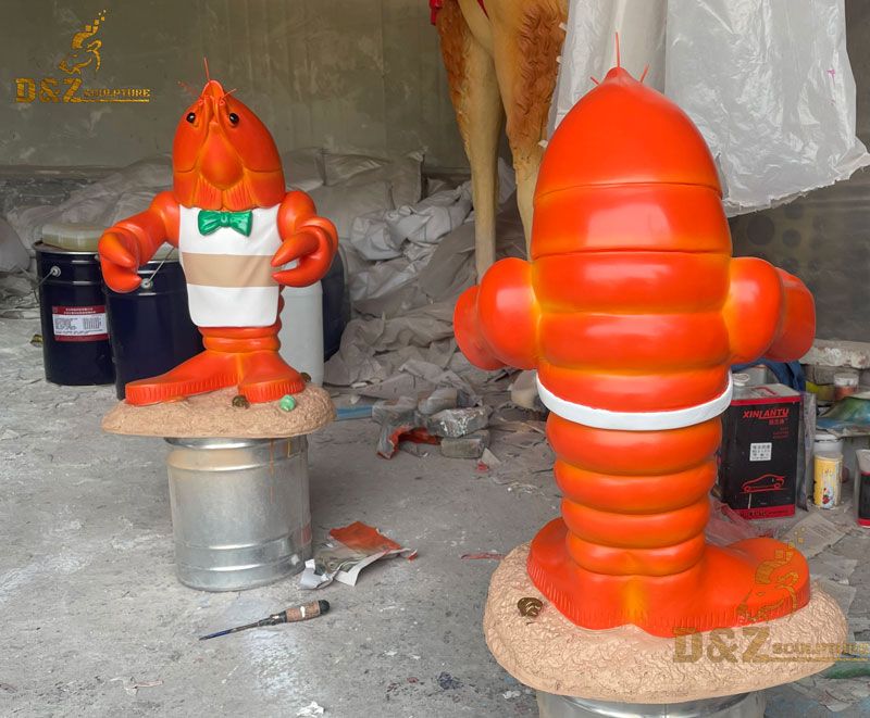 lobster statue holding plate