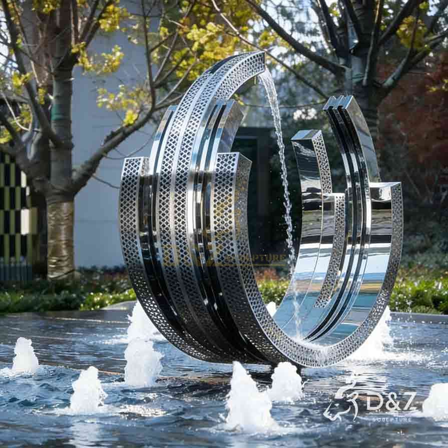 Modern Stainless Steel Nested Ring Fountain Sculpture | Outdoor water feature 6 Modern Stainless Steel Nested Ring Fountain Sculpture | Outdoor water feature 6