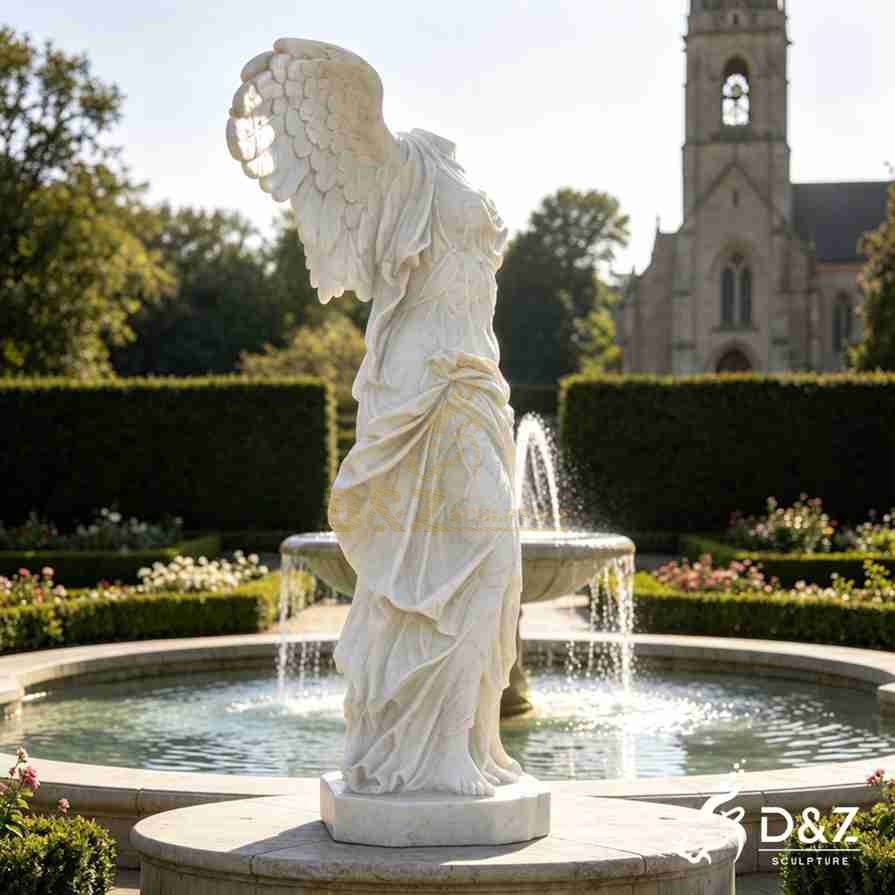 Profile view white marble headless angel statue, classical draped robe carving Profile view white marble headless angel statue, classical draped robe carving