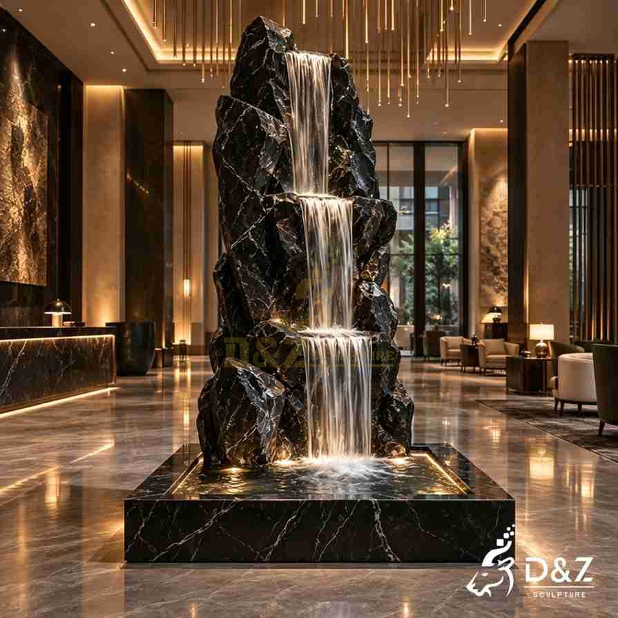 Slim three-tier black marble zen indoor fountain designed for a modern hotel lobby Slim three-tier black marble zen indoor fountain designed for a modern hotel lobby