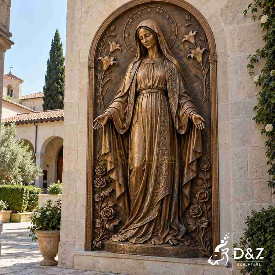 Vintage Virgin Mary wall statue in antique bronze with a star halo, detailed lilies, roses, and decorative religious relief patterns. Vintage Virgin Mary wall statue in antique bronze with a star halo, detailed lilies, roses, and decorative religious relief patterns.