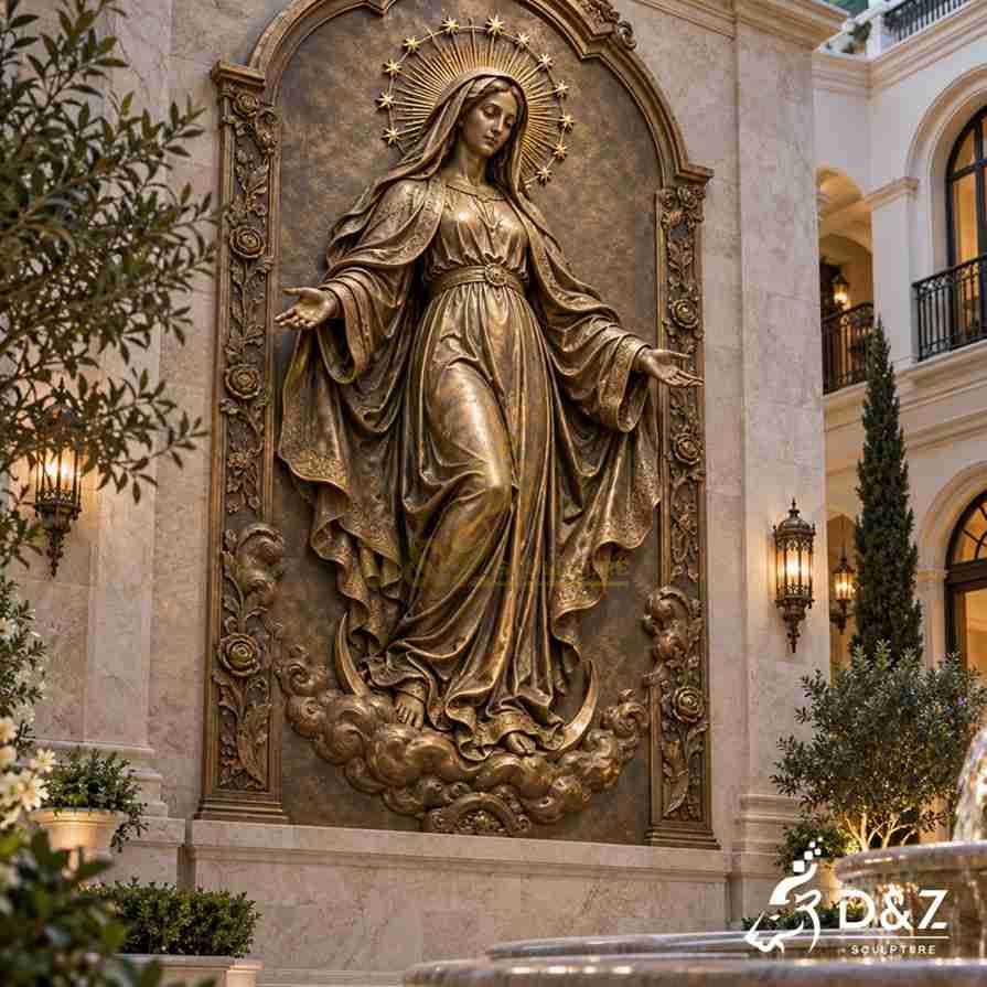 Bronze Virgin Mary wall statue featuring a decorative star halo, crescent moon, carved clouds, and flowing robes with an antique bronze finish. Bronze Virgin Mary wall statue featuring a decorative star halo, crescent moon, carved clouds, and flowing robes with an antique bronze finish.