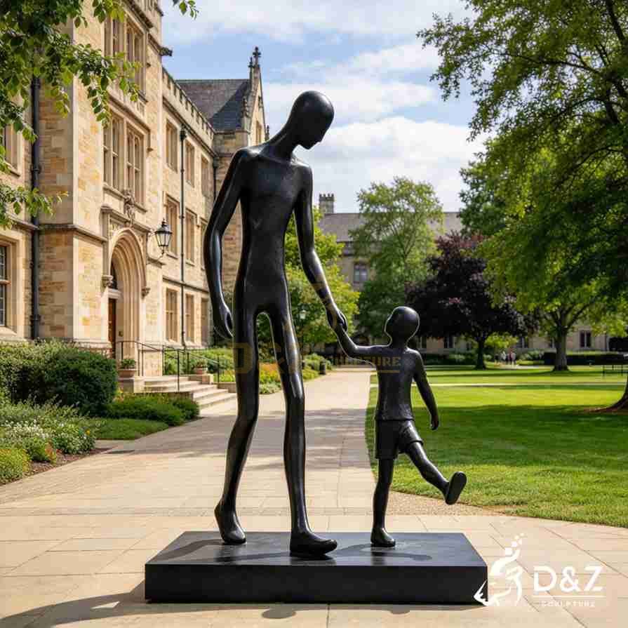 Black father and son sculpture holding hands, with the father looking down at his child beside a stone building. Black father and son sculpture holding hands, with the father looking down at his child beside a stone building.